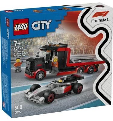 F1®-es kamion egy F1®-es Audi versenyautóval